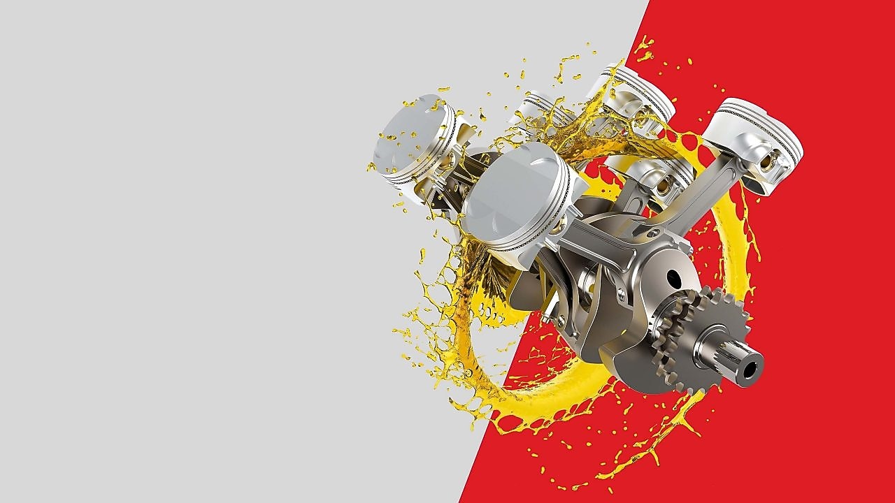 Motor auta v olejovom koliesku na sivo-červenom pozadí